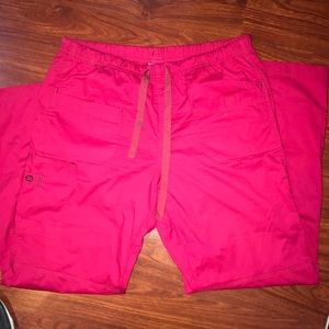 Dark red scrub pants.